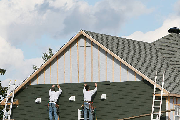 Professional Siding Installation technician working in Woodleaf, NC